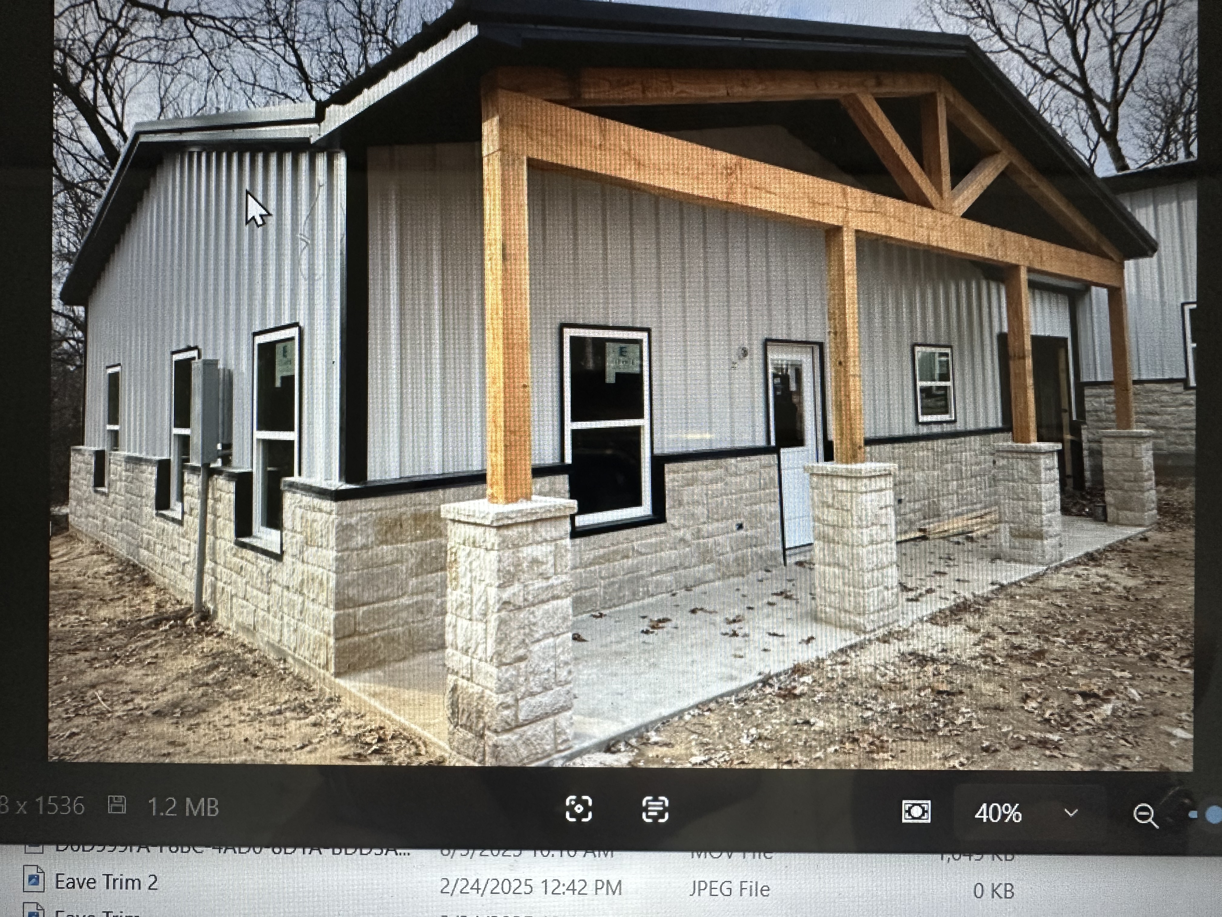 Commercial building with stone wainscot by Jaybird Construction