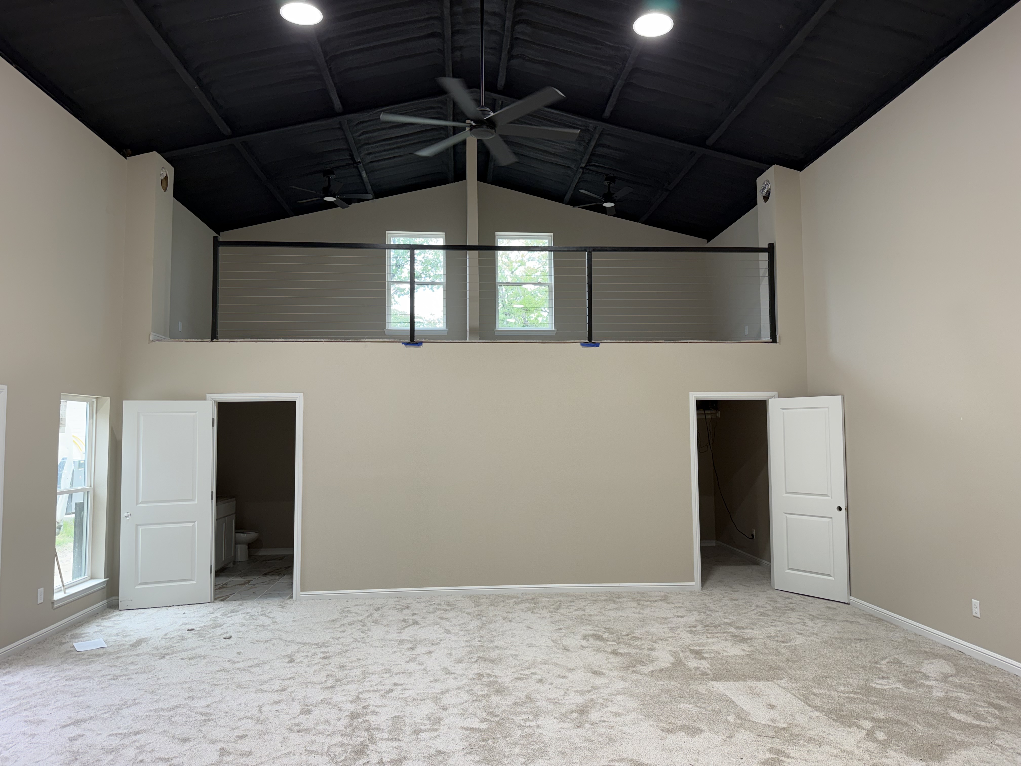 Barndominium loft interior finish-out by Jaybird Construction