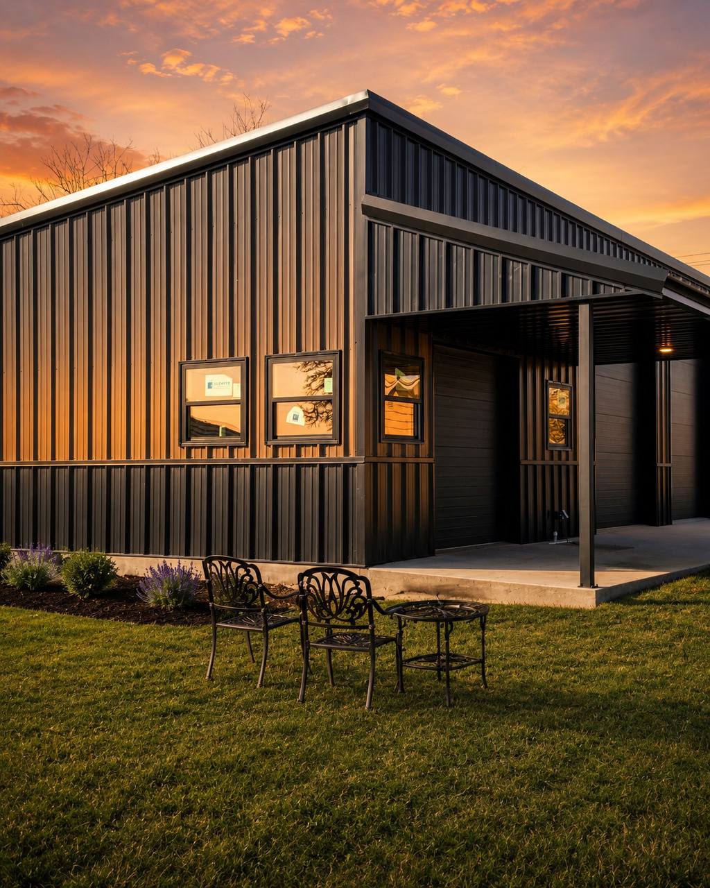 Barndominium exterior at sunset