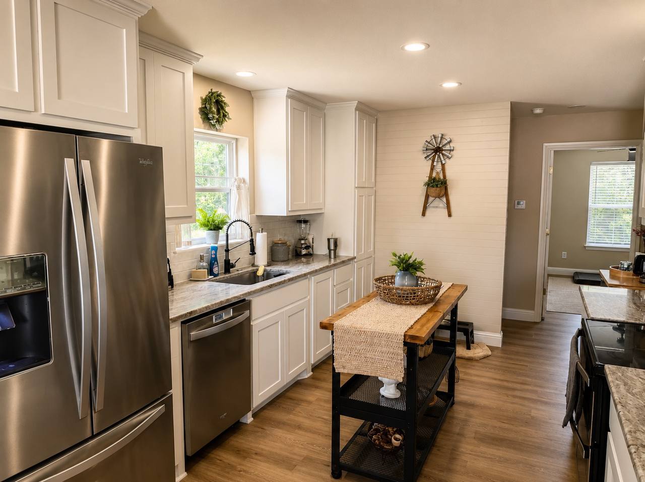 Barndominium kitchen with island and stainless appliances